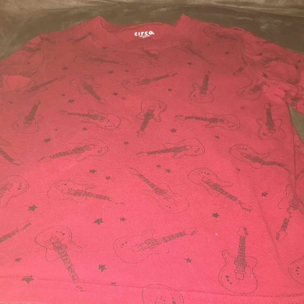 Boys t shirt guitars all over it